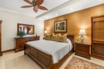 Unwind after a day at the beach in your master bedroom with king bed, flat screen TV and attached lanai